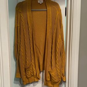 2Love s/med mustard color cardigan.  Like new